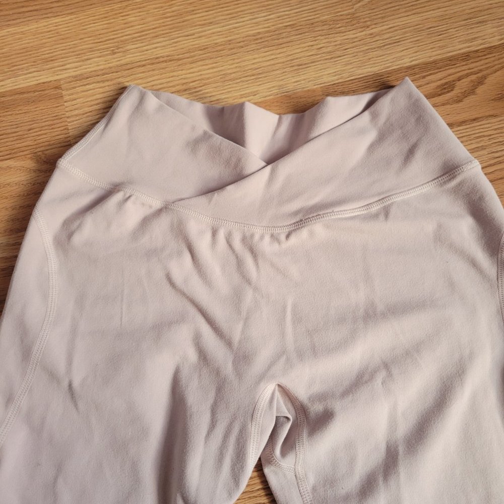 Alphalete cross front leggings in nude